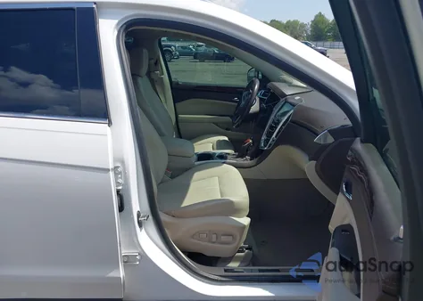 2014 Cadillac Srx Luxury Collection z USA, uszkodzony, nr VIN 3GYFNBE31ES646202